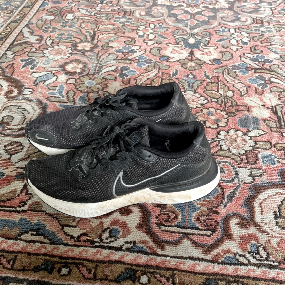 Size 12 Nike Renew Running Shoes. Great pair of everything shoes. Have been used